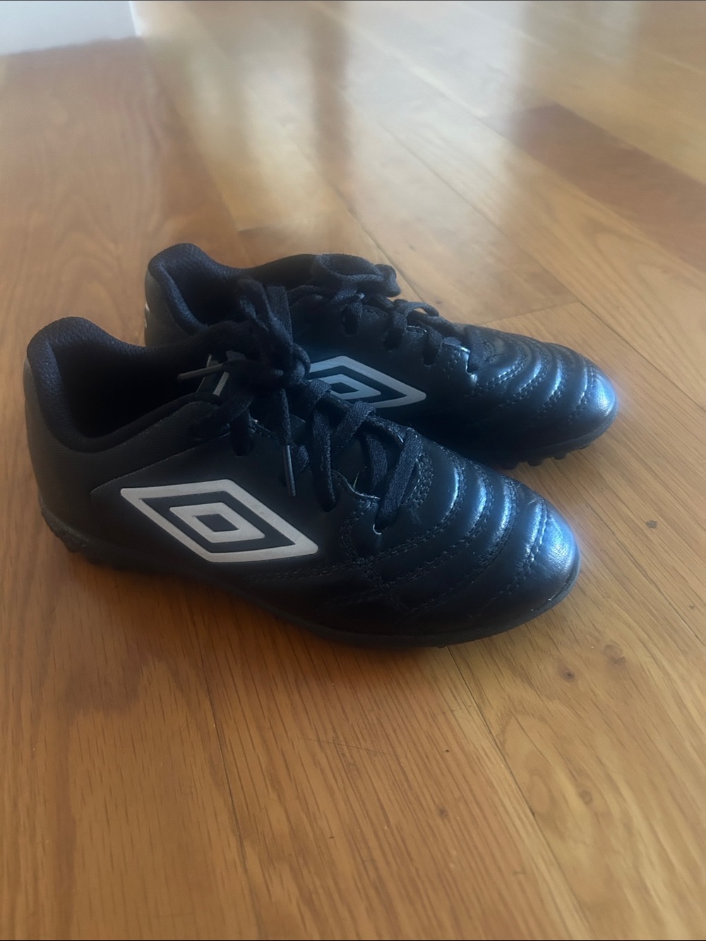 Umbro Kids Black Soccer Sneakers with White Logo